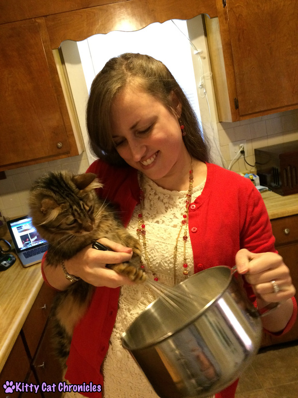 Photo: Caster helping to mix the ingredients