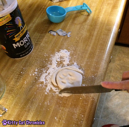 Photo: Trimming dough